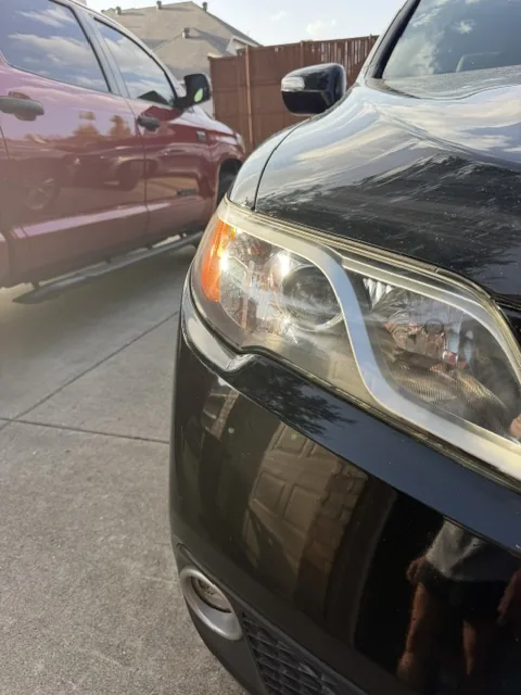 Clear Acura headlight after restoration