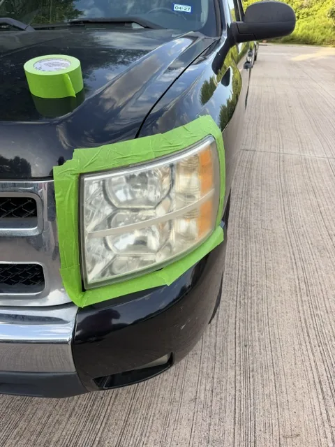 Cloudy Chevrolet truck headlight before restoration