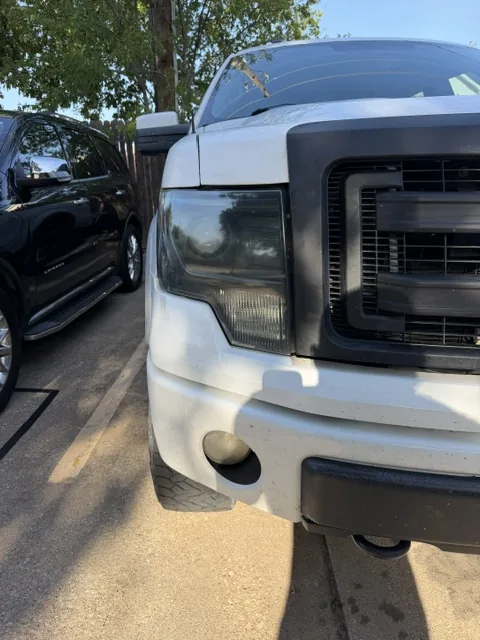 Clear Ford F-150 headlight after professional restoration