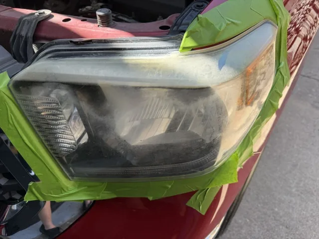 Oxidized Toyota Tundra headlight before restoration
